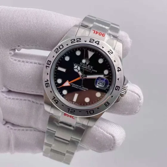 Luxury stainless steel watch with luminous indices and orange dual time zone hand