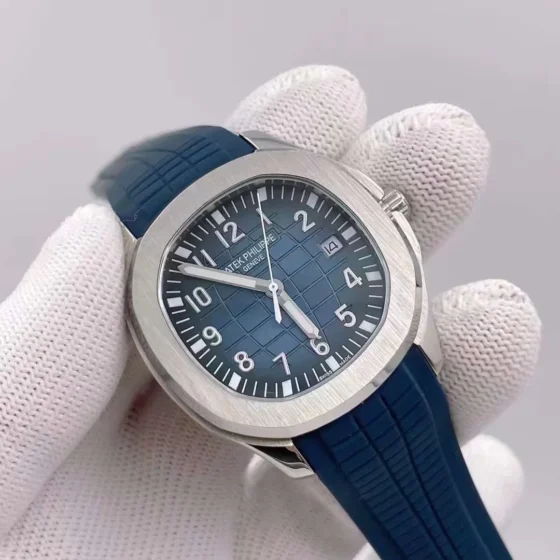Close up shot of premium blue embossed checkerboard dial with luminous numerals