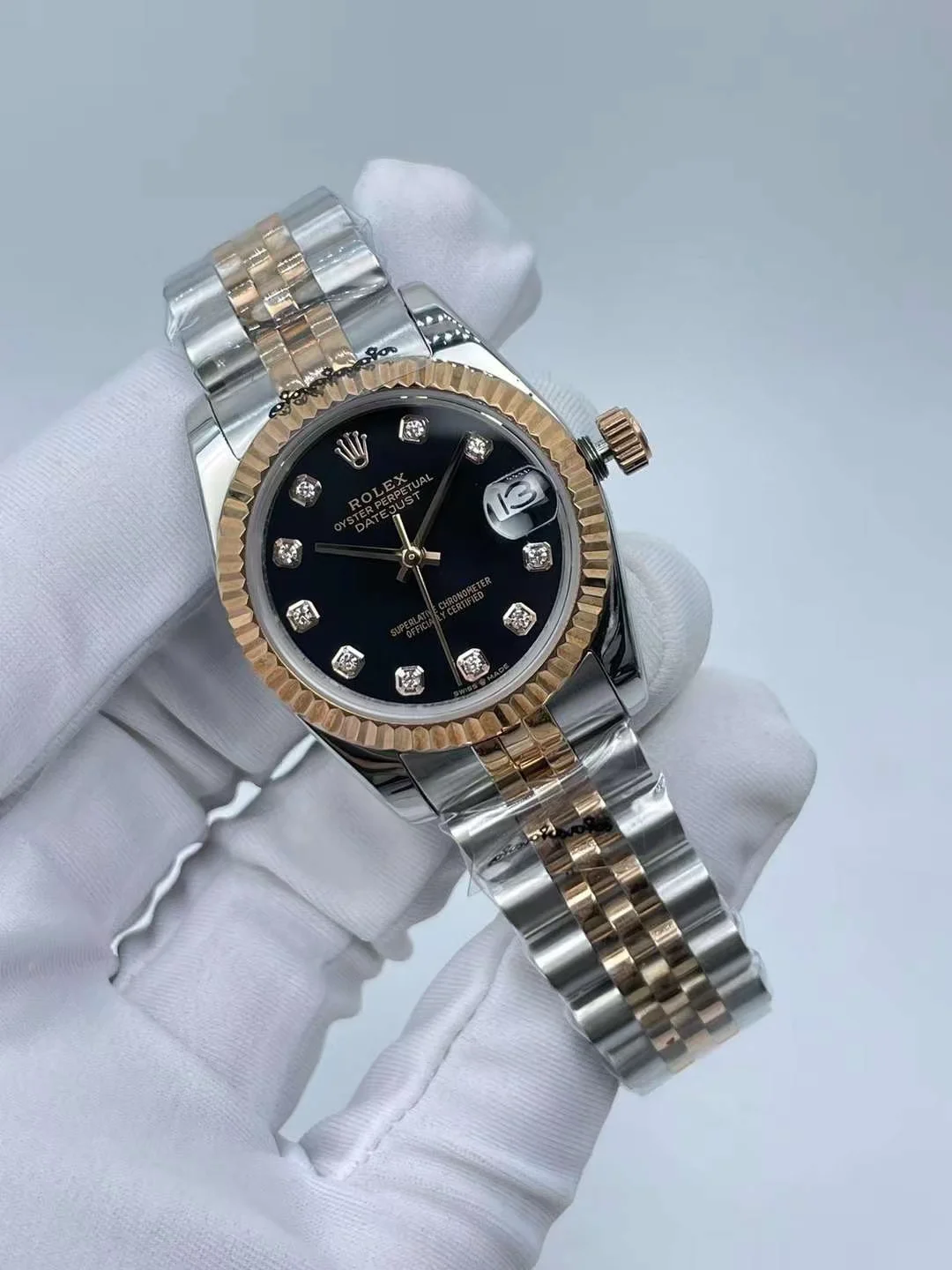 Rolex Datejust 31mm luxury watch with black diamond dial