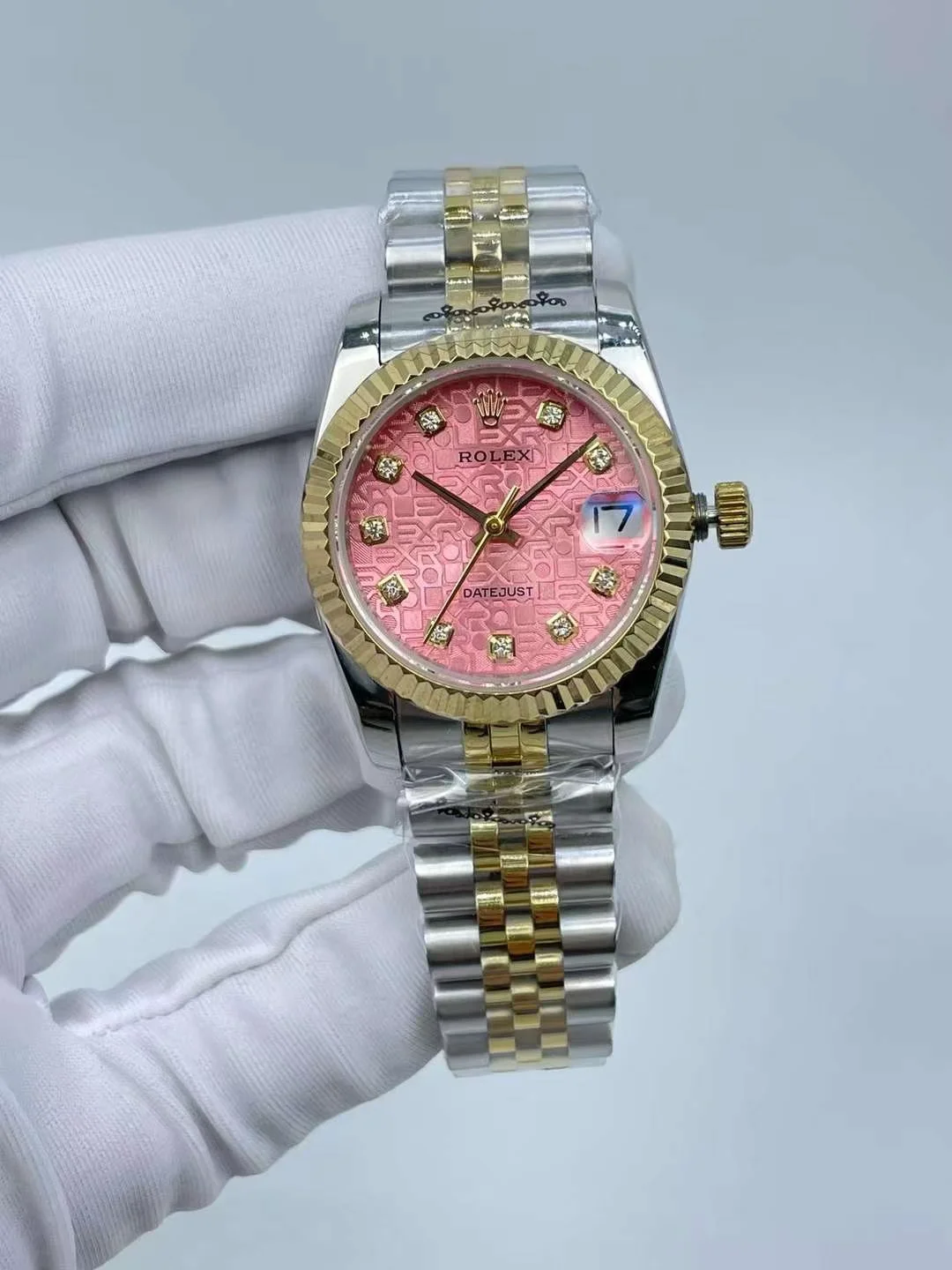 Rolex Datejust 31mm luxury watch with pink jubilee diamond dial