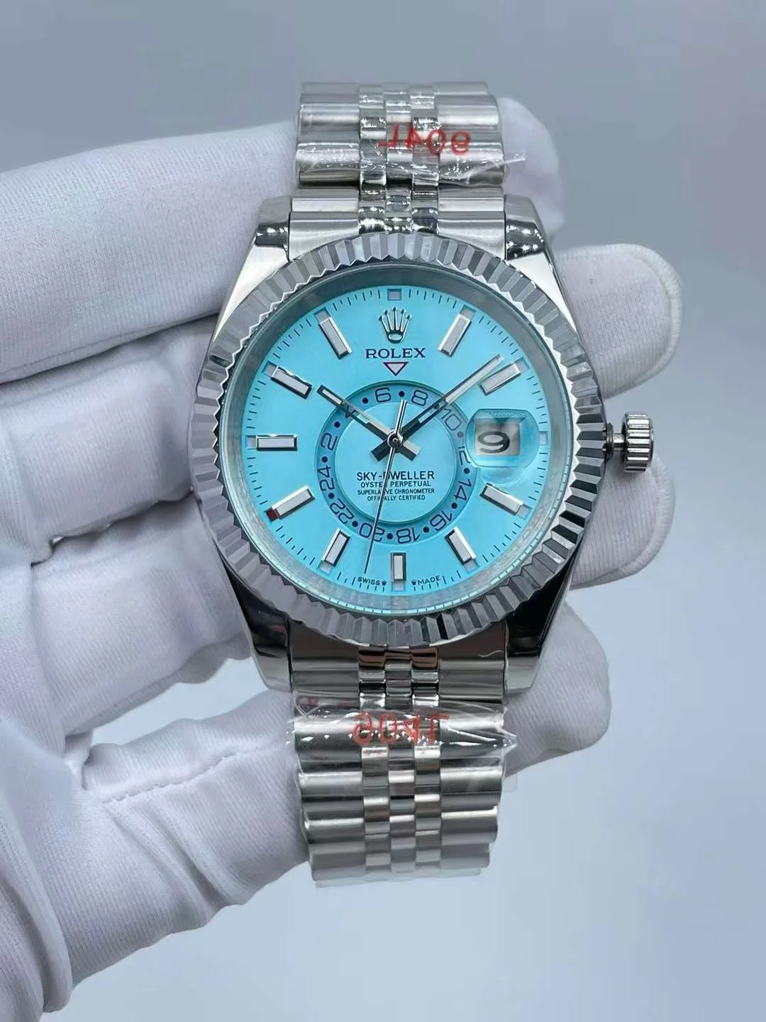 Rolex Sky-Dweller luxury watch with a stunning turquoise dial on stainless steel bracelet