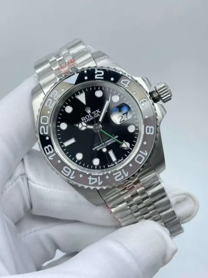 Rolex GMT-Master II watch with grey and black ceramic bezel