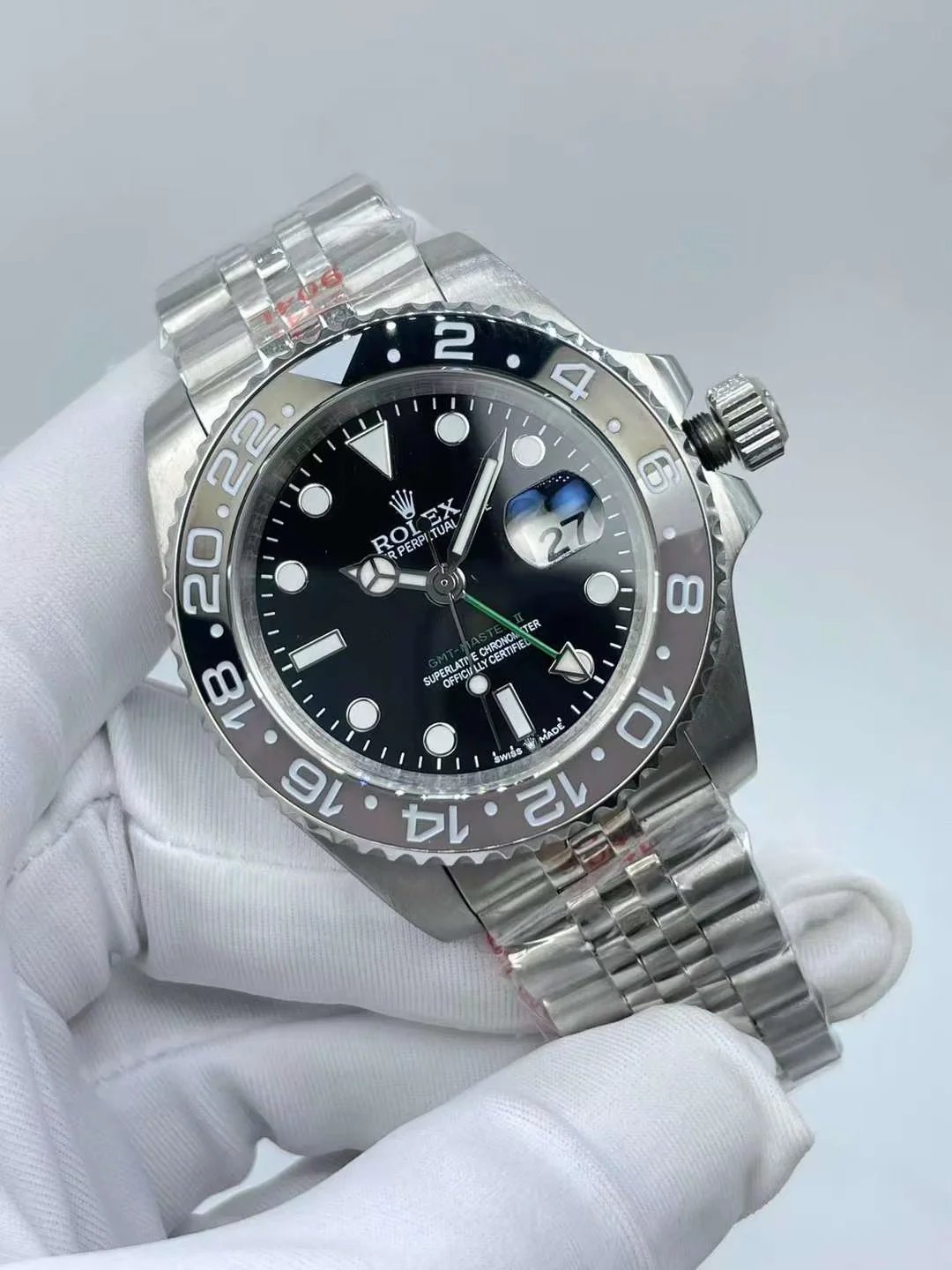 Rolex GMT-Master II watch with grey and black ceramic bezel