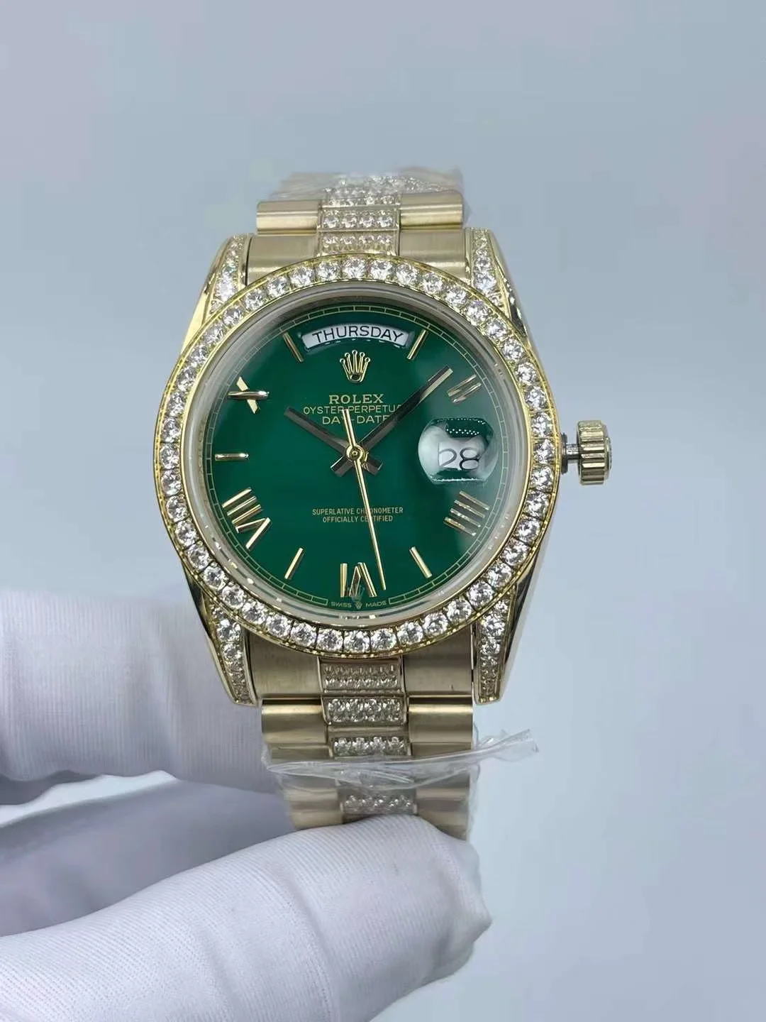 1288-0 Rolex Day-Date 36mm luxury watch with green dial and diamond bezel